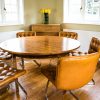 Italian Tan Leather Dining Chairs at table 2