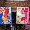 Pair of Tin Lolly Advertising Plates set front